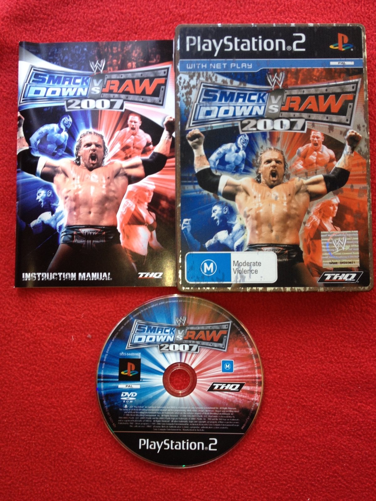 WWE SmackDown vs. Raw 2007 STEELBOOK - PS2 Game - PlayStation 2, Games, Fighting - Level Up Gaming NZ